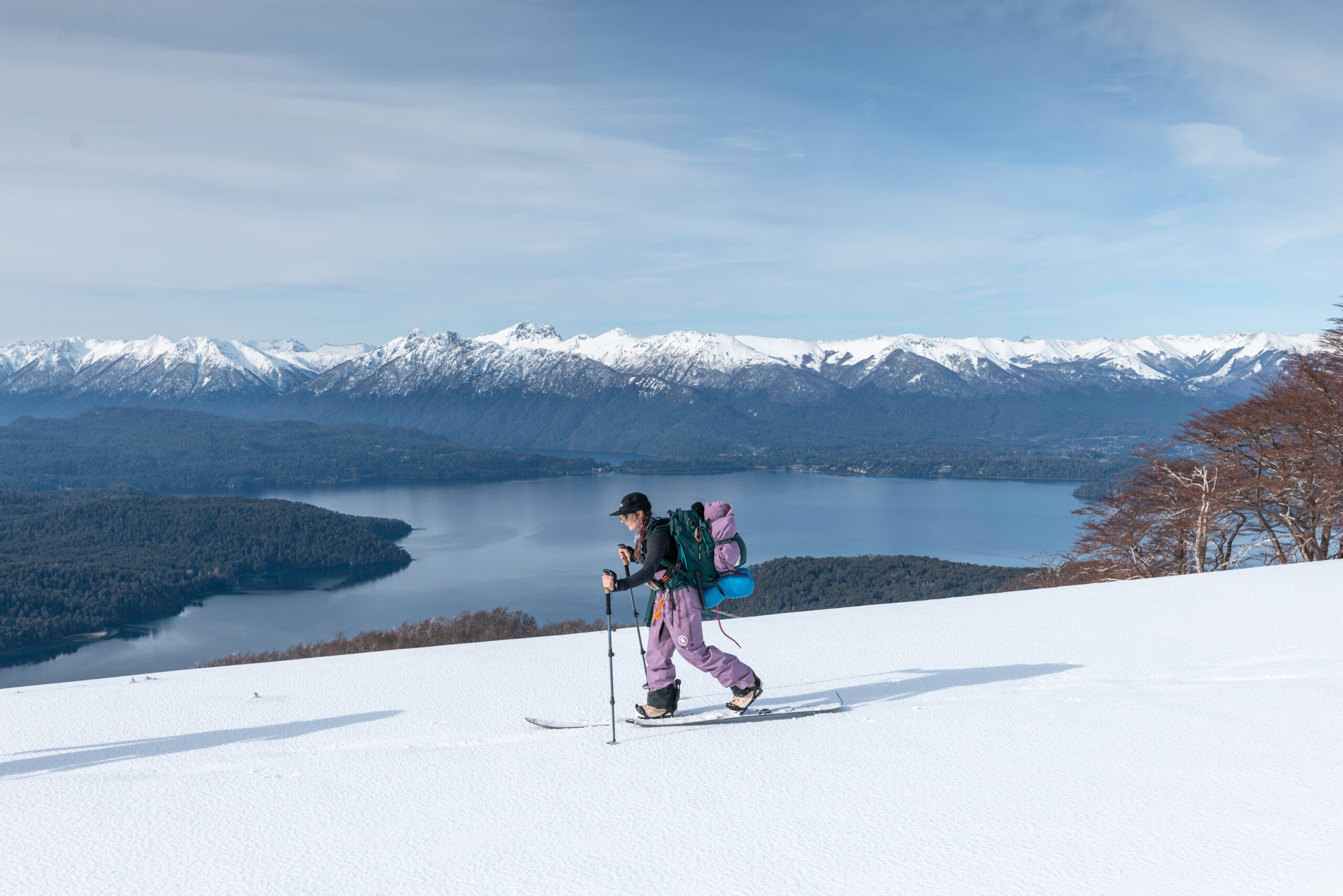 Female snowboarders on a guided splitboarding adventure in the Andes near Bariloche.